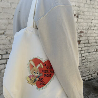 White tote bag with "Girls I Met Online" graphic